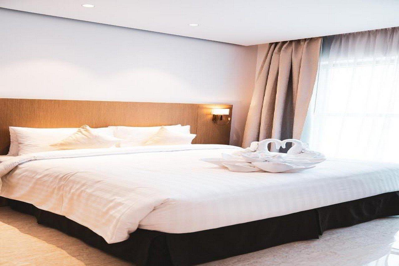 He Hotel Apartments Ντουμπάι Εξωτερικό φωτογραφία A bed